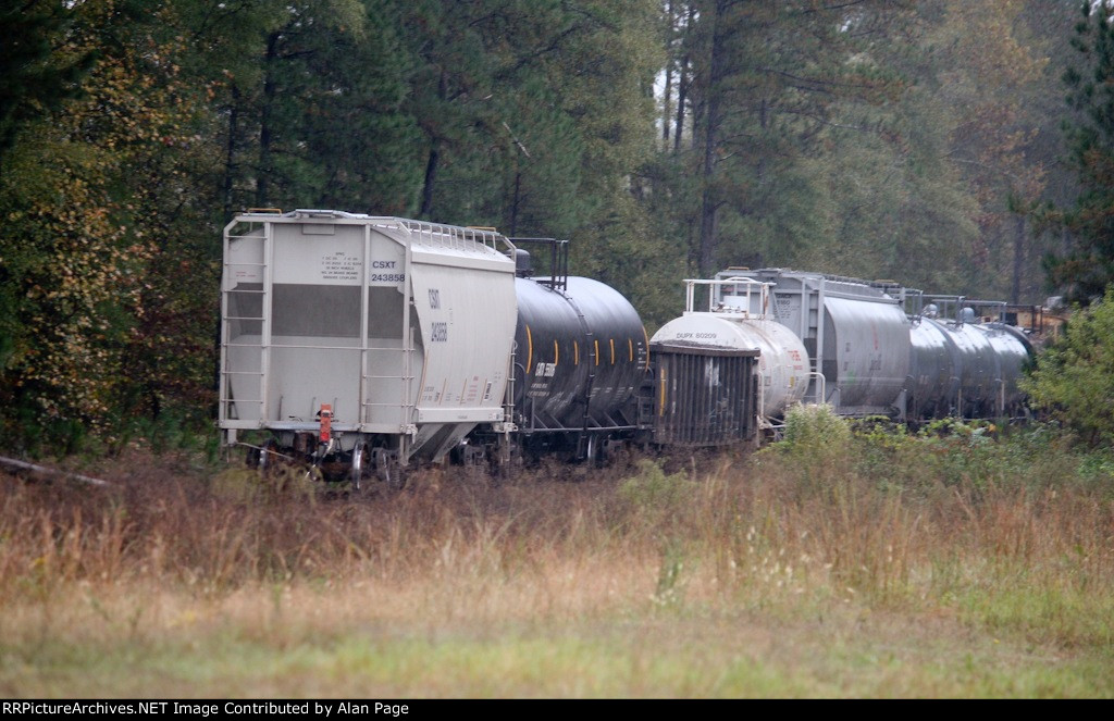 CSXT 243858 covered hopper at the tail end